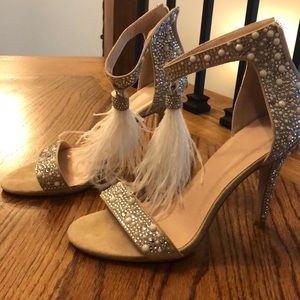 High heel sparkle and feather shoes.
